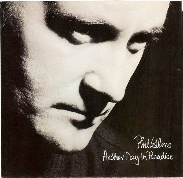 Phil Collins : Another Day In Paradise (7", Single)
