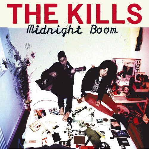 the album cover for The Kills - Midnight Boom