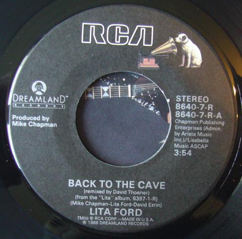Lita* : Back To The Cave (7", Single)