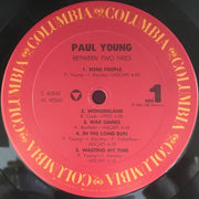 Paul Young : Between Two Fires (LP, Album, Pit)