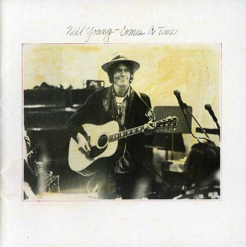 the album cover for Neil Young - Comes a Time