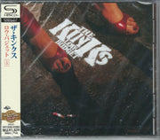 the album cover for The Kinks - Low Budget