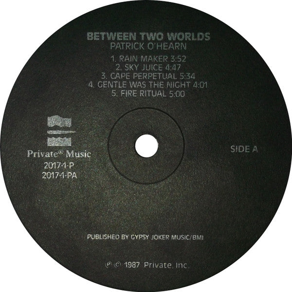 Patrick O'Hearn : Between Two Worlds (LP, Album, Bla)