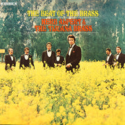 the album cover for Herb Alpert & Tijuana Brass - The Beat Of The Brass