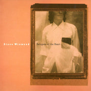 the album cover for Steve Winwood - Refugees Of The Heart [LP]