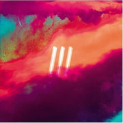 the album cover for Magic In Threes - Three