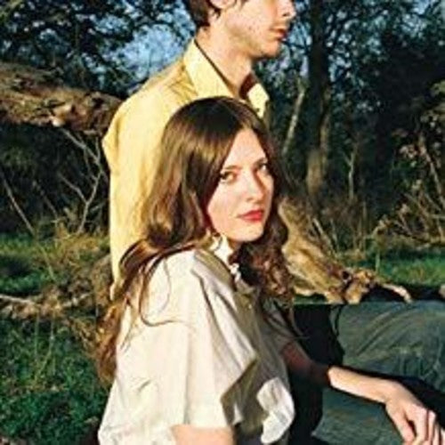 the album cover for Molly Burch - First Flower [Indie Exclusive Limited Edition White LP]