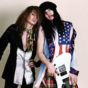 the album cover for Redd Kross - Teen Babes From Monsanto [Indie Exclusive Limited Edition Peak Vinyl]