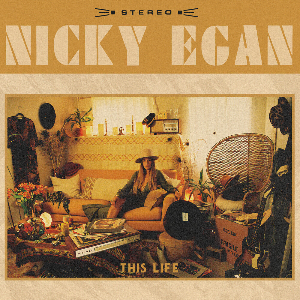 the album cover for Nicky Egan - This Life [Indie Exclusive Limited Edition Translucent Orange LP]