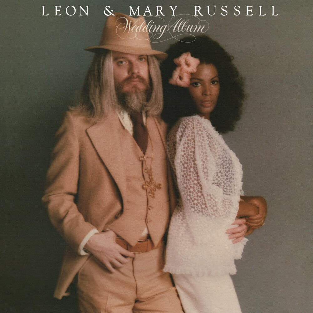 the album cover for Leon Russell - Wedding Album [Clear Vinyl] (Gol) [Limited Edition] (Aniv)