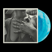 the album cover for The Menzingers - On the Impossible Past - Anniversary Ed. - Baby Blue White Galax