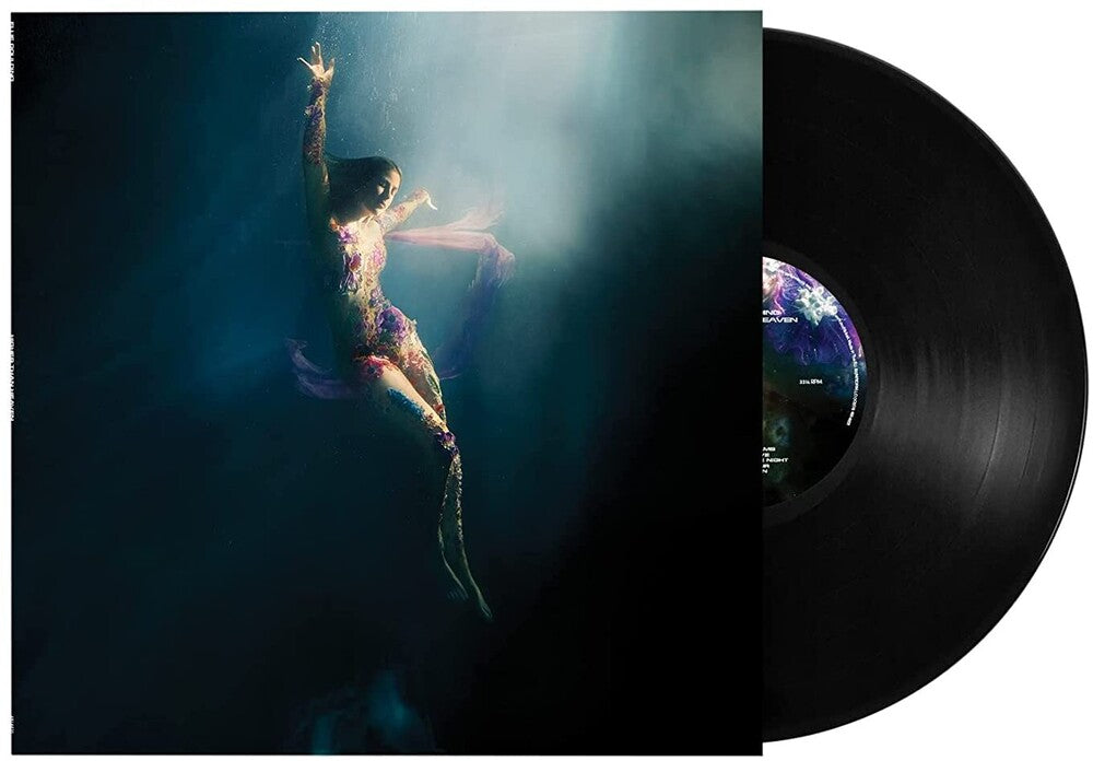 the album cover for Ellie Goulding - Higher Than Heaven [LP]