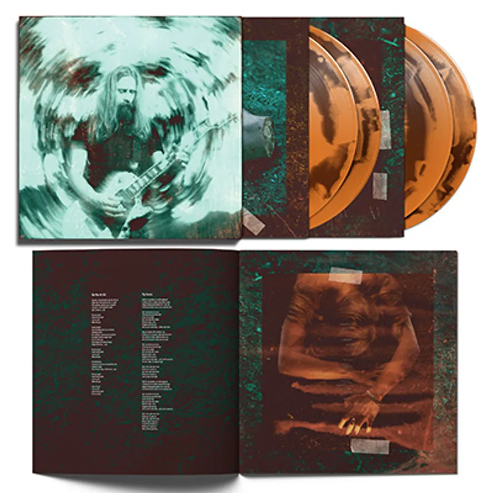 the album cover for Jerry Cantrell - Degradation Trip: 20th Anniversary [180g Orange & Brown 4LP]