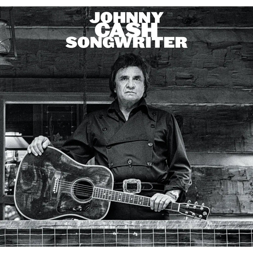 the album cover for Johnny Cash - Songwriter [Indie Exclusive Translucent Clear with Black Splatter]
