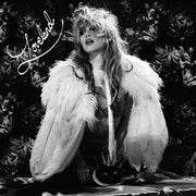 the album cover for Suki Waterhouse - Loveland [Red LP/Poster]