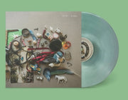 the album cover for Califone - villagers [Coke Bottle Clear LP]