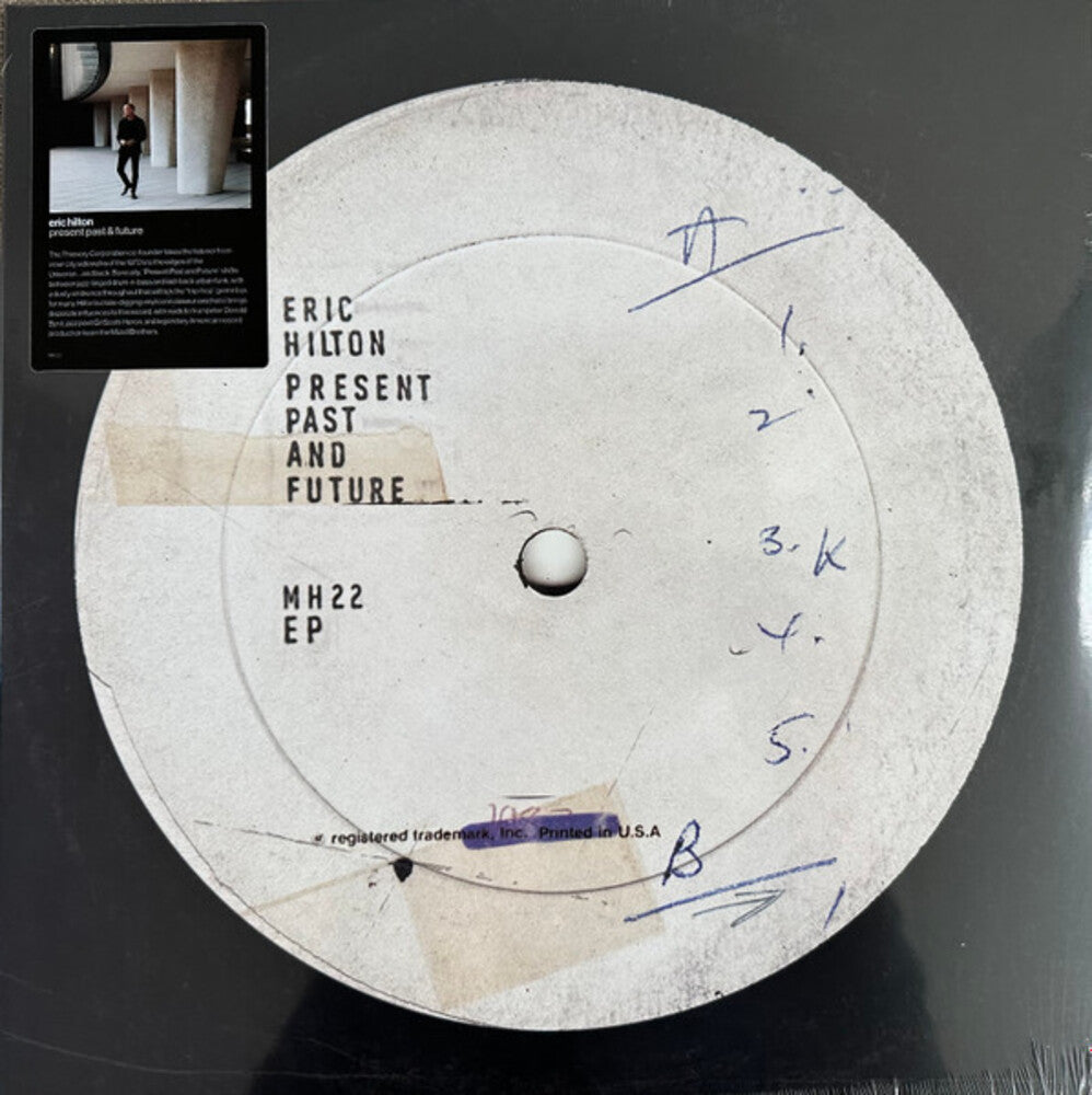 the album cover for Eric Hilton - Present Past And Future [Clear Vinyl]