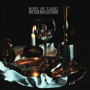the album cover for Body of Light - Bitter Reflection - Gold Black Smash (Blk) [Colored Vinyl]