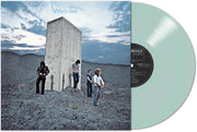 the album cover for The Who - Who's Next: Remastered [Indie Exclusive Limited Edition Coke Bottle Clear LP]
