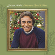 the album cover for Johnny Mathis - Christmas Time Is Here [Colored Vinyl] (Grn) [Limited Edition]