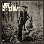 the album cover for Lost Dog Street Band - Survived [LP]