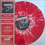 the album cover for Elton John - Don't Shoot Me I'm Only The Piano Player [Red Splatter 180g LP]