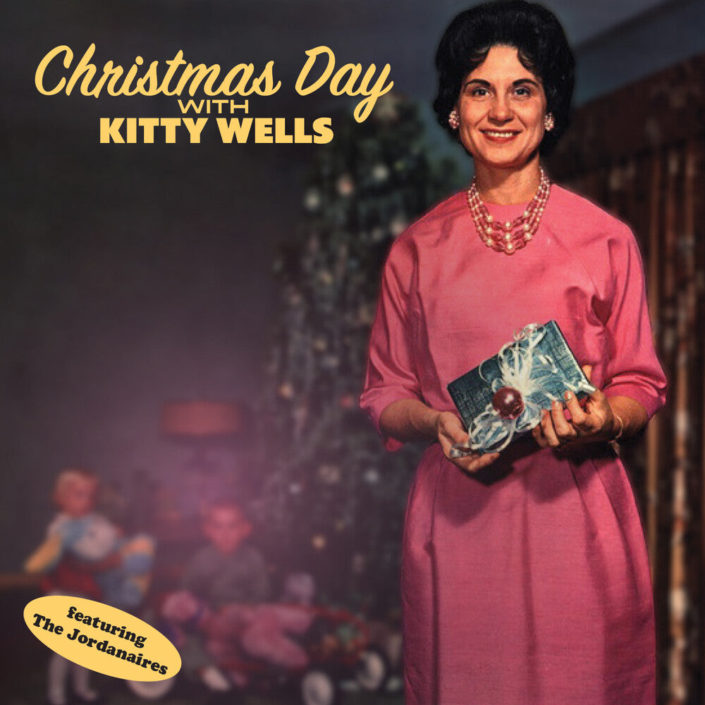 the album cover for Kitty Wells  & The Jordanaires - Christmas Day With Kitty Wells (Mod)