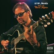 the album cover for Al Di'meola - One Of These Nights