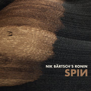the album cover for Nik Baertschs  Ronin - Spin (Uk)