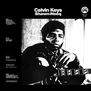 the album cover for Calvin Keys - Shawn-Neeq (Blk) (Blue) [Colored Vinyl]