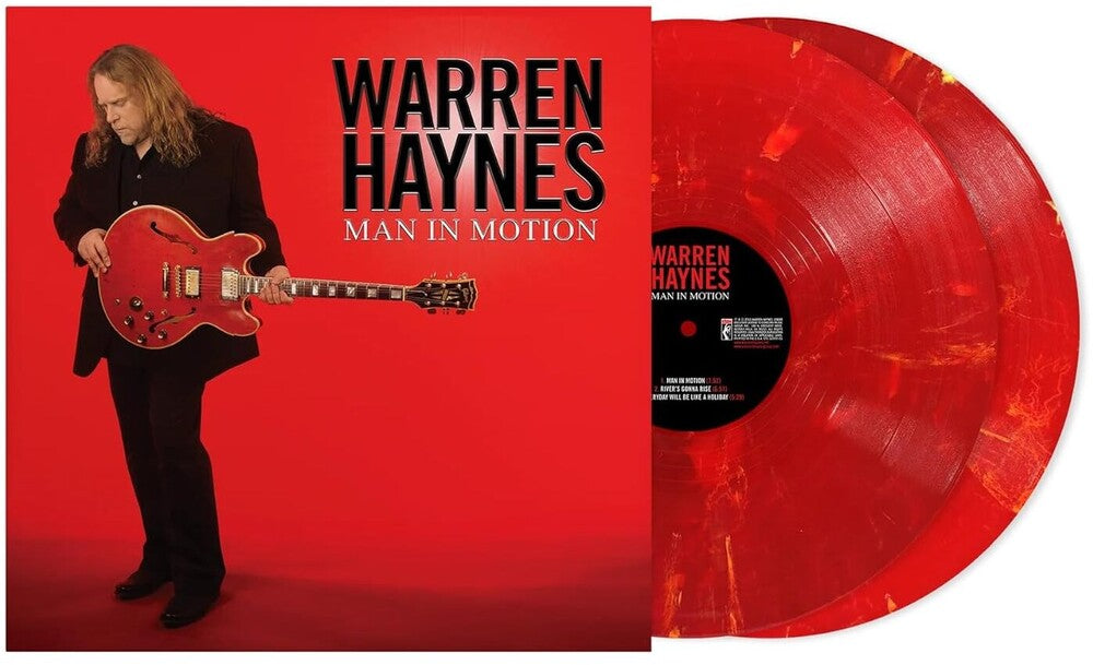 the album cover for Warren Haynes - Man In Motion [Red Marble 2LP]