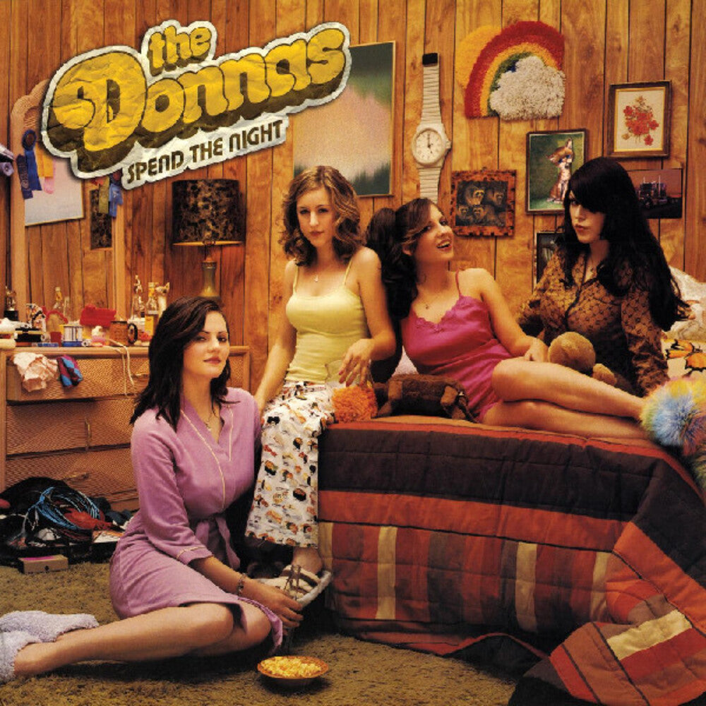 the album cover for Donnas - Spend The Night [Clear Vinyl] (Pnk) (Ylw) (Spla)