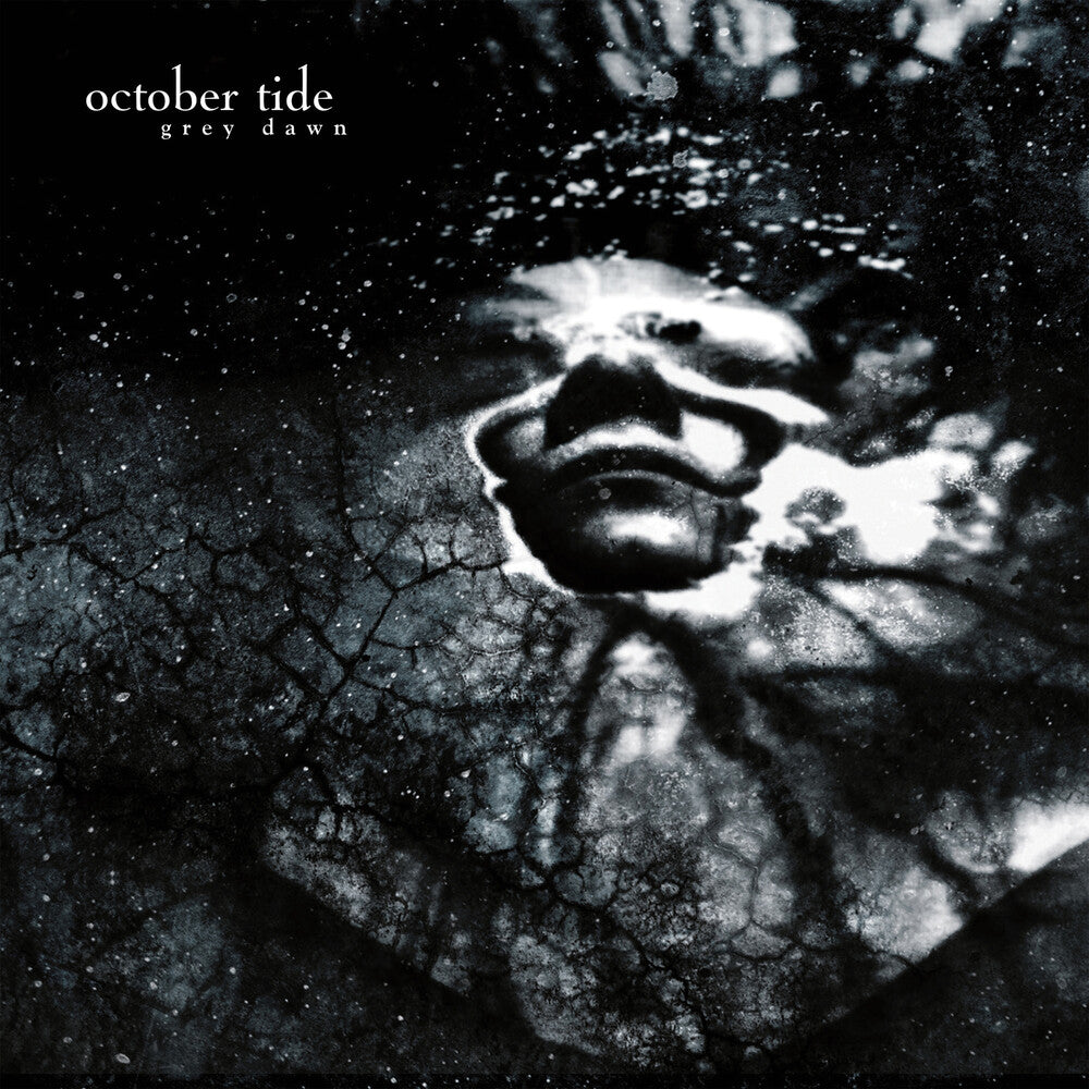 the album cover for October Tide - Grey Dawn