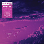 the album cover for Tate McRae - Hung Up On You / One Day (Live) [Colored Vinyl] [RSD 2026]