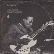 the album cover for Buddy Guy - I Was Walking Through The Woods [180 Gram]