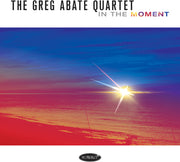 the album cover for Greg & Bill O'connell & Harvie S Abate - In the Moment