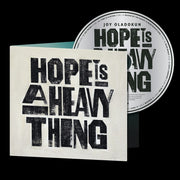the album cover for Joy Oladokun - Hope Is A Heavy Thing
