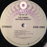 The Sherbs : Defying Gravity (LP, Album, All)